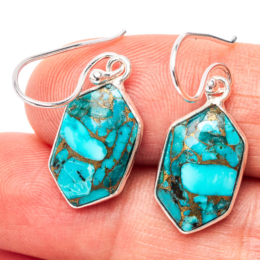 Turquoise teardrop earrings in .925 sterling silver with copper matrix detail