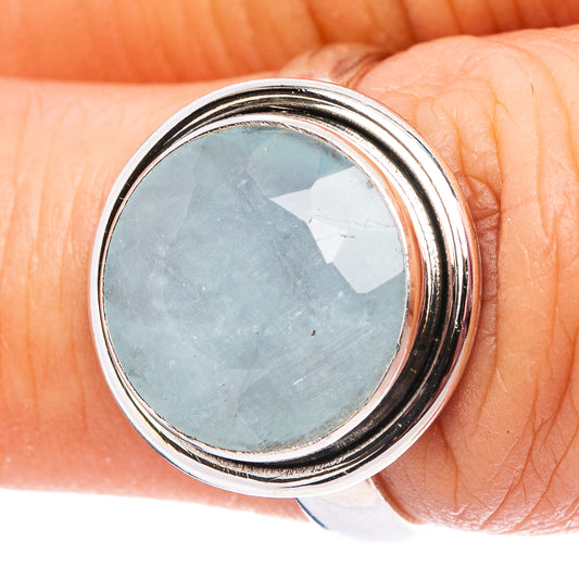 Aquamarine sterling silver ring with oval bezel-set light blue gemstone