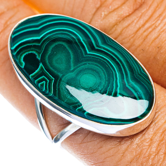 Oval malachite cabochon ring, green striped stone set in polished sterling silver band