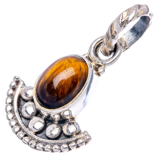 Tiger's eye pendant in .925 sterling silver with oval amber cabochon and ornate bail