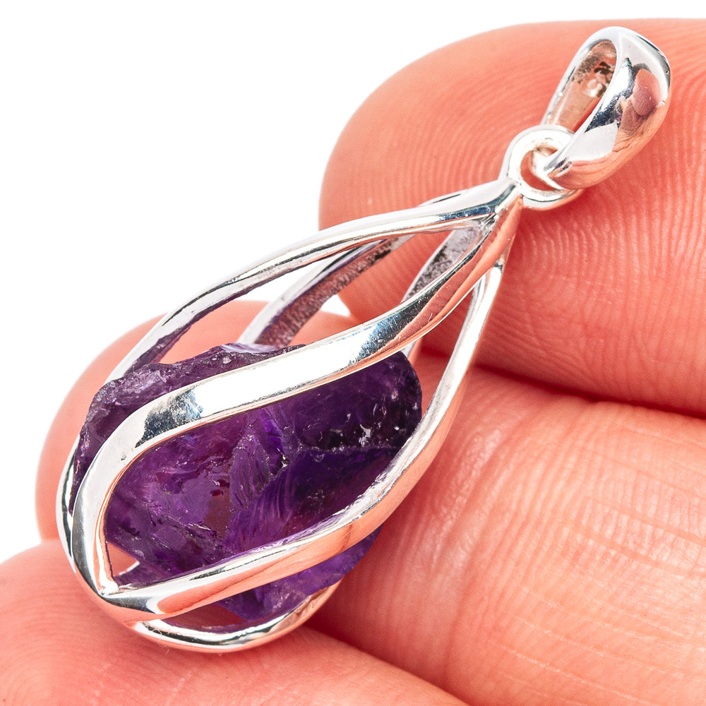 Sterling silver amethyst teardrop pendant with faceted purple gemstone bezel setting