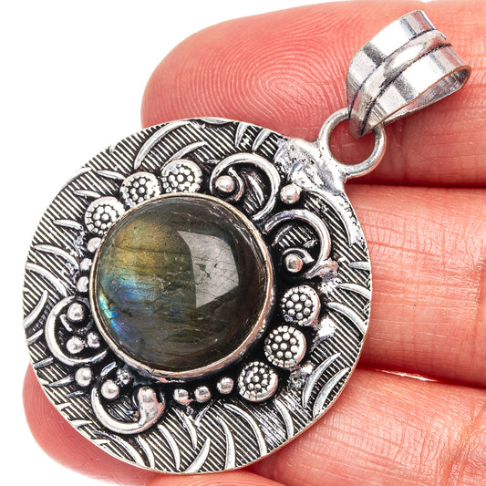Labradorite cabochon pendant in German silver, ornate oval frame with bail loop