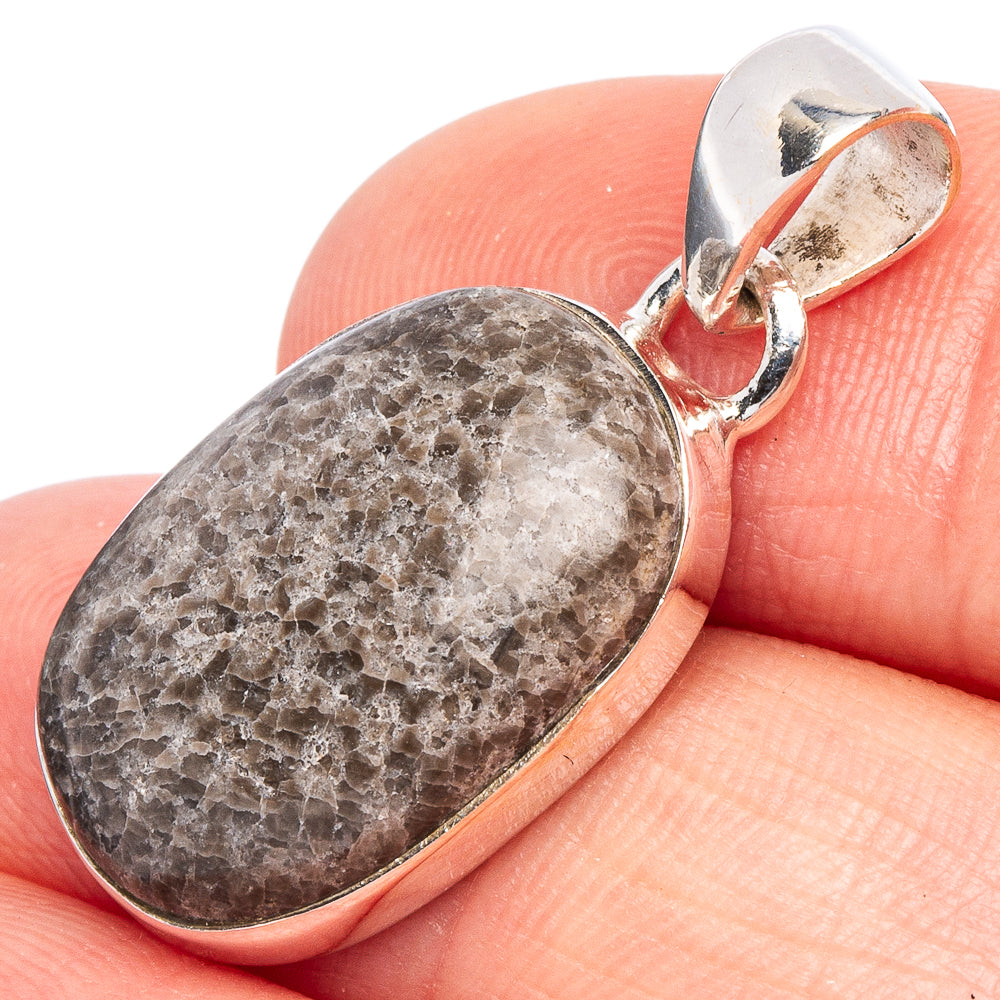 Oval black coral pendant in 925 sterling silver bezel with loop bail