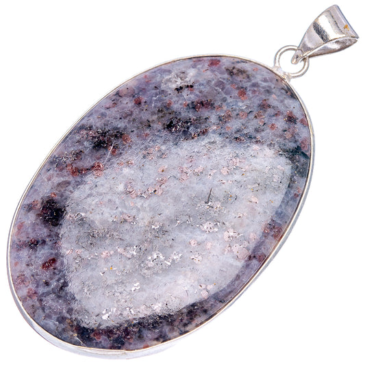 Silver-plated oval palm stone pendant with purple-blue mottled speckled surface