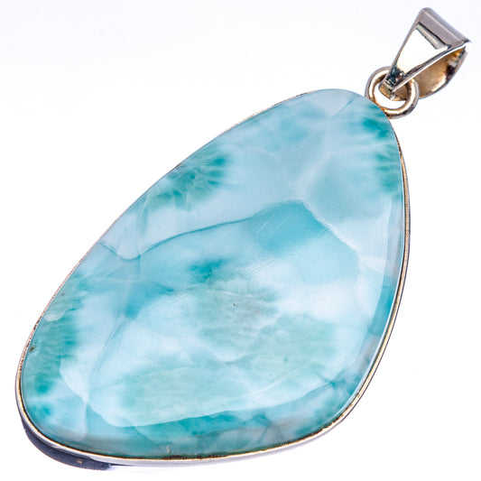 Larimar teardrop pendant, sky-blue marbled stone with sterling silver frame