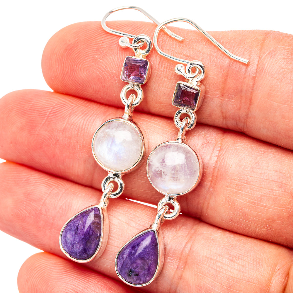Silver drop earrings with purple square, round moonstone, and purple teardrop charms