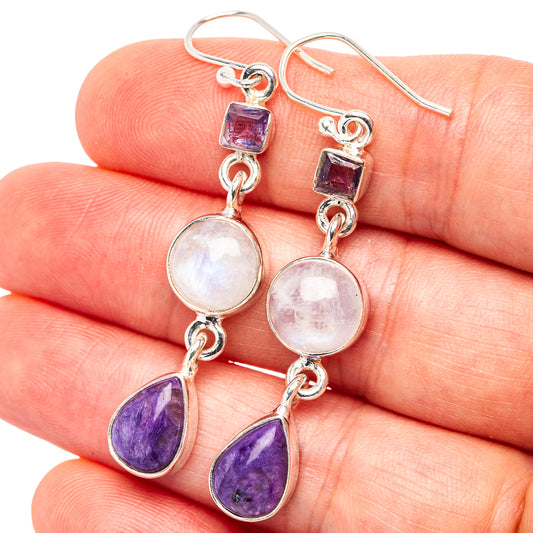 Silver drop earrings with purple square, round moonstone, and purple teardrop charms