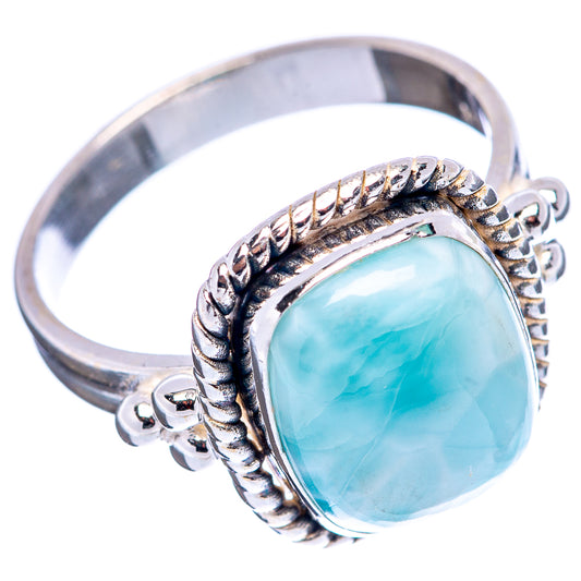 Sterling silver larimar ring with ornate rope setting and oval light-blue cabochon