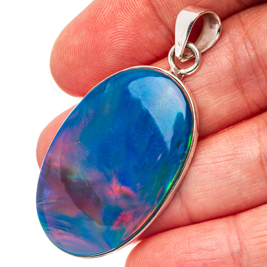 Sterling silver opal pendant with teardrop blue, purple, and green iridescence