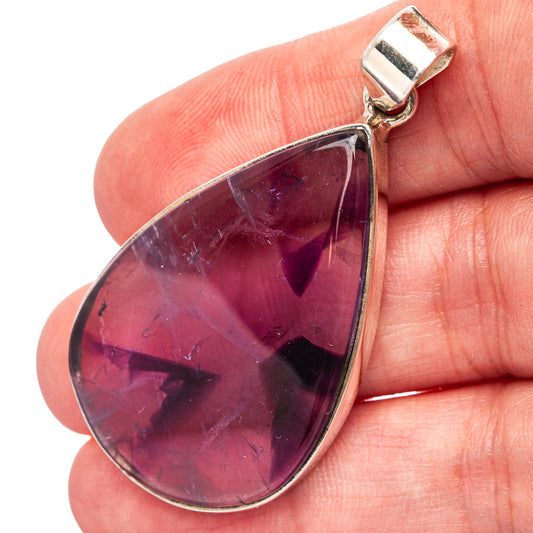 Amethyst teardrop pendant in .925 sterling silver bezel, with top bail
