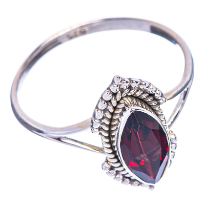 Dainty garnet ring, silver band with oval dark-red gemstone and raised patterned sides