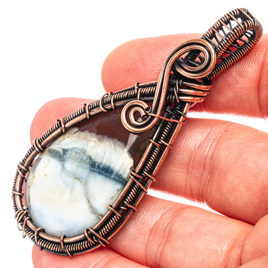 Oxidized copper wire-wrapped opal pendant with oval cabochon and loop bail