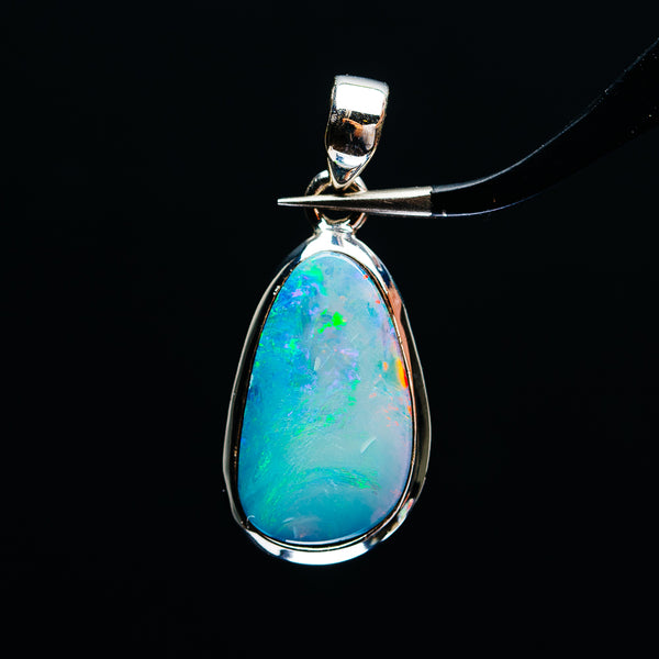 Teardrop opal pendant in .925 sterling silver with blue-green color play