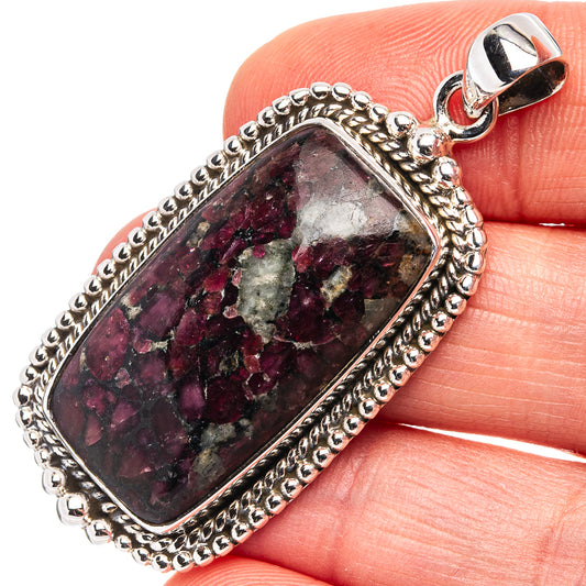 Lepidolite-in-quartz pendant with rectangular purple crystal set in silver