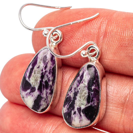 Sterling silver teardrop earrings with purple and white gemstone dangles