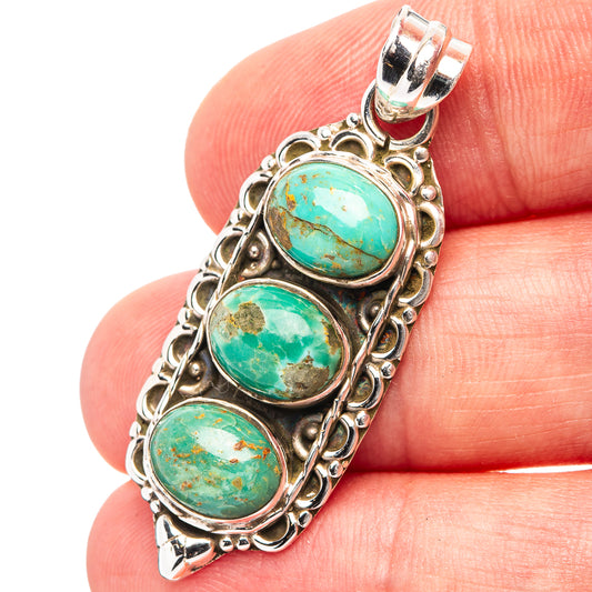 Turquoise oval cabochon pendant in .925 sterling silver, three-stone design