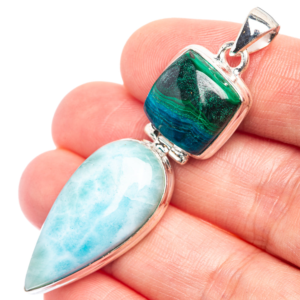 Sterling silver pendant with light blue teardrop stone and green-blue rectangular stone