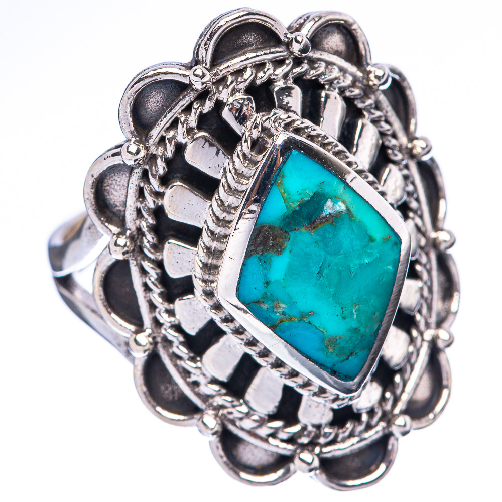 Sterling silver ring with ornate bezel and rectangular turquoise gemstone, side details