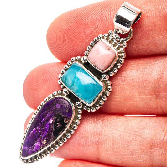 Sterling silver pendant with pink opal, blue larimar, and purple sugilite stones