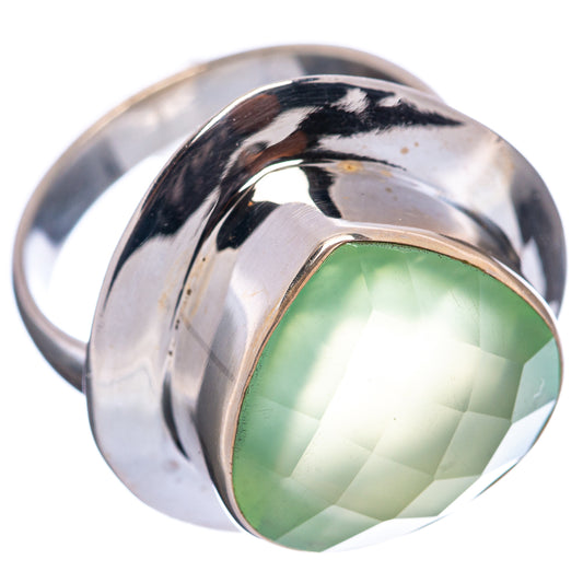 Polished sterling silver prehnite ring, side view of green oval faceted stone