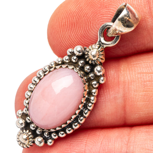 Pink opal pendant in .925 sterling silver with pink oval cabochon and beaded border