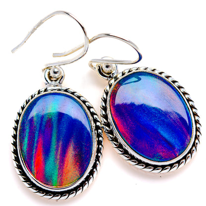 Oval opal-style earrings with ornate silver bezels and rainbow iridescent stones