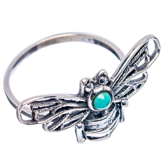 Turquoise bee sterling silver ring, side view with turquoise cabochon and ornate wing details