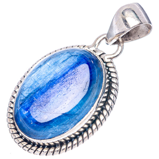 Oval blue stone pendant with textured sterling silver bezel and top loop bail