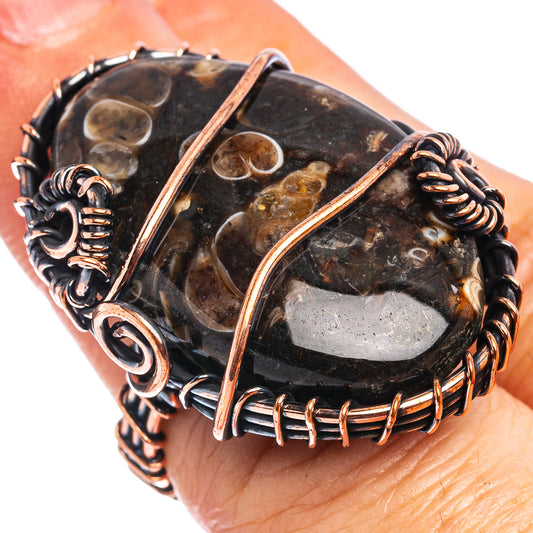 Wire wrap ring, size 5: dark turritella agate oval in oxidized copper