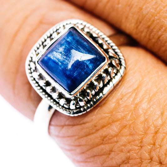 Sterling silver kyanite ring with square blue cabochon and ornate bezel