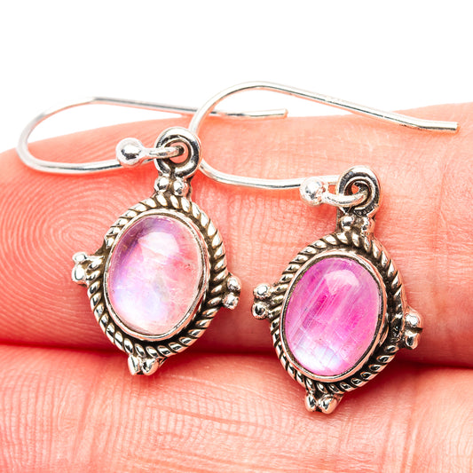 Sterling silver drop earrings with oval pink moonstone and ornate halo settings