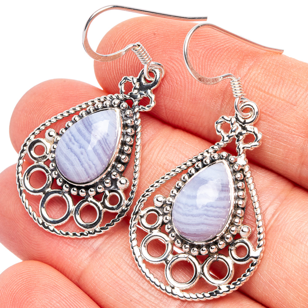 Teardrop blue lace agate sterling silver drop earrings with ornate oval frame