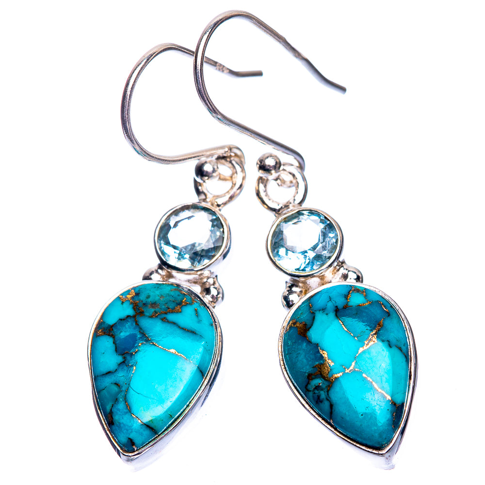 Sterling silver drop earrings with turquoise teardrop stones and blue topaz accents