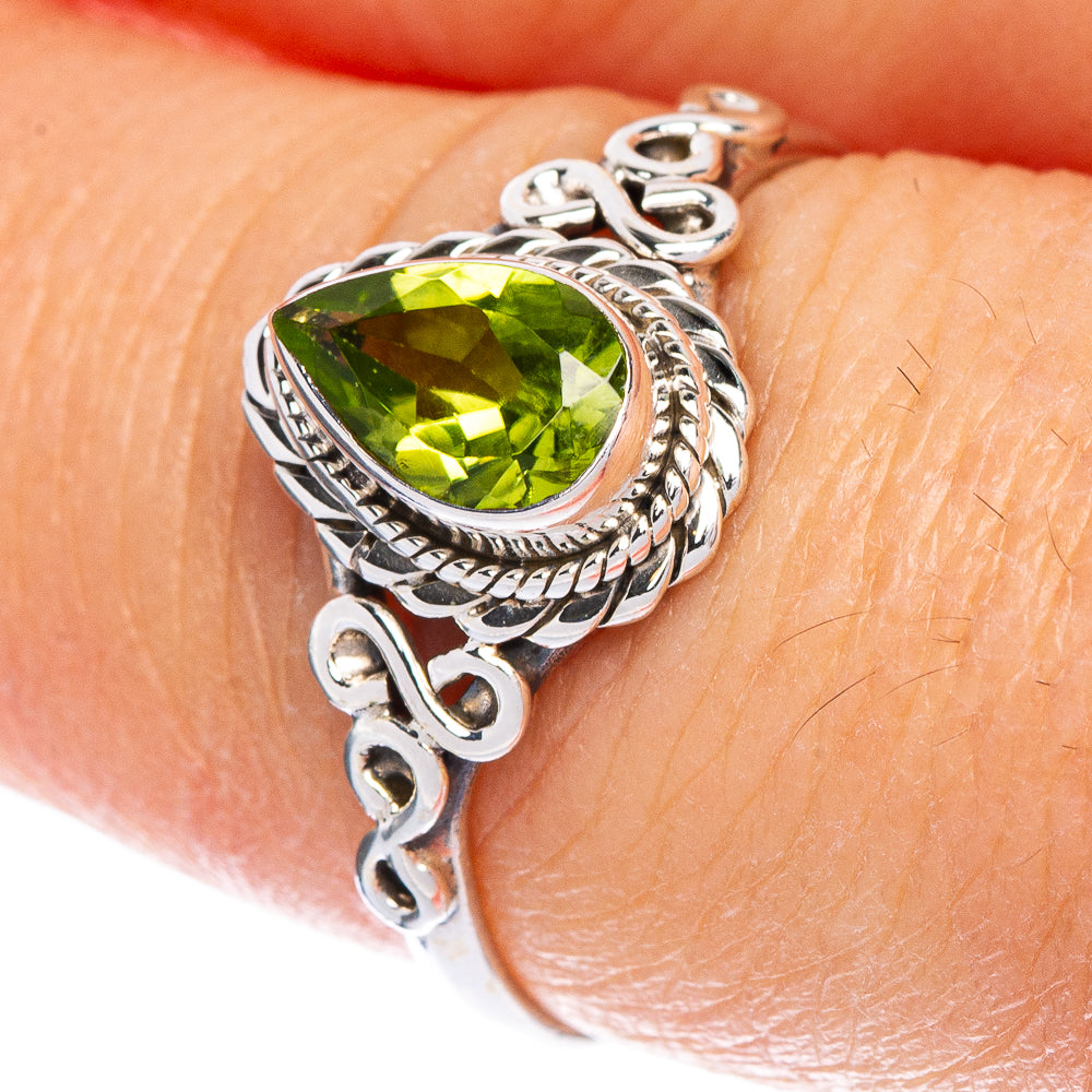 Sterling silver peridot dainty ring with oval green gemstone and ornate band