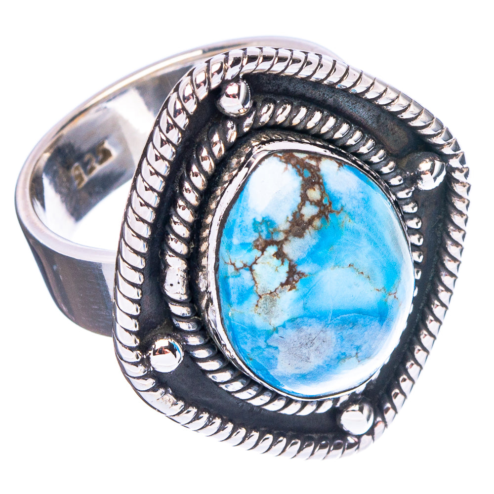 Turquoise oval cabochon with ornate beaded frame on dark silver adjustable ring