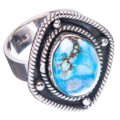 Turquoise oval cabochon with ornate beaded frame on dark silver adjustable ring