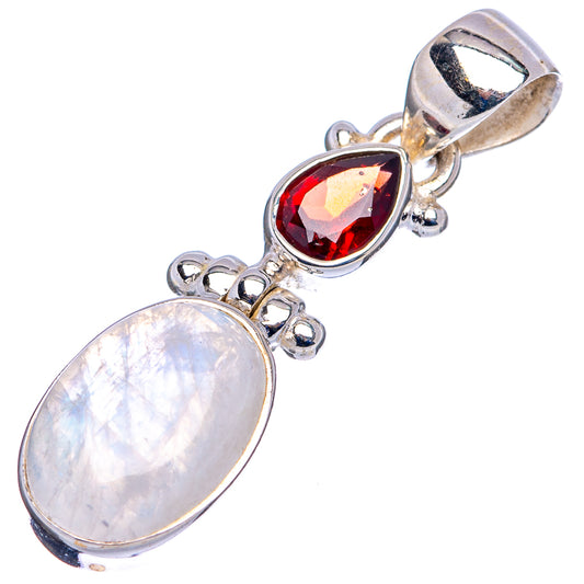 Sterling silver pendant with red oval garnet center and large opalescent moonstone