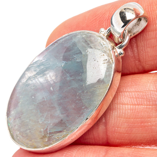 Oval aquamarine pendant in .925 sterling silver bezel, close-up on bail
