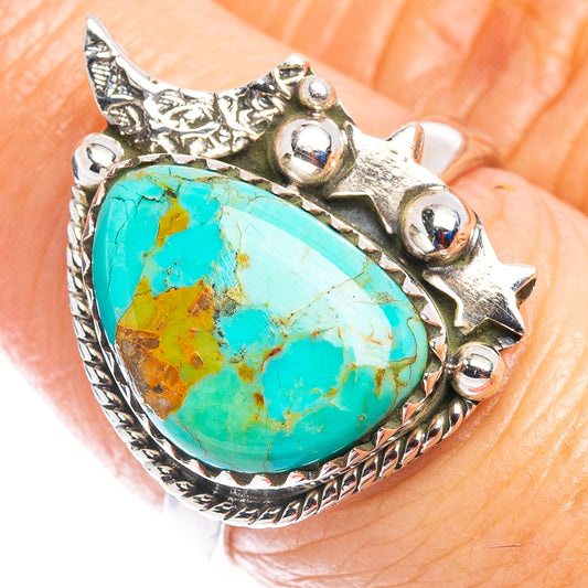 Sterling silver turquoise oval cabochon ring with spiked star accents, size 7