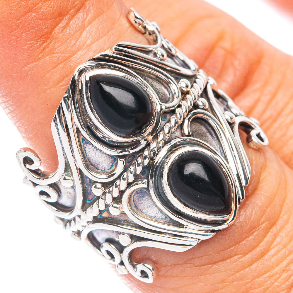 925 sterling silver ring with two black oval onyx cabochons and bead edges