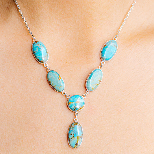 Sterling silver jasper necklace with five blue oval stones in bezel settings