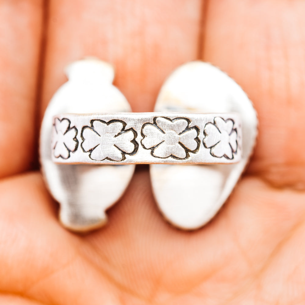 Sterling silver adjustable ring band with engraved clover and floral pattern
