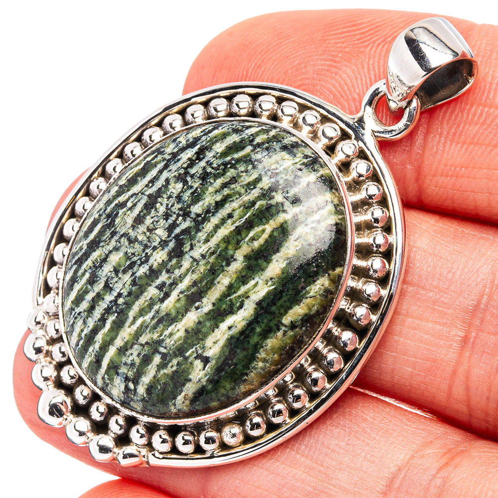 Oval green opal pendant in .925 sterling silver beaded bezel with loop bail