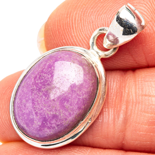 Oval purple gemstone pendant in polished .925 sterling silver bezel with loop bail