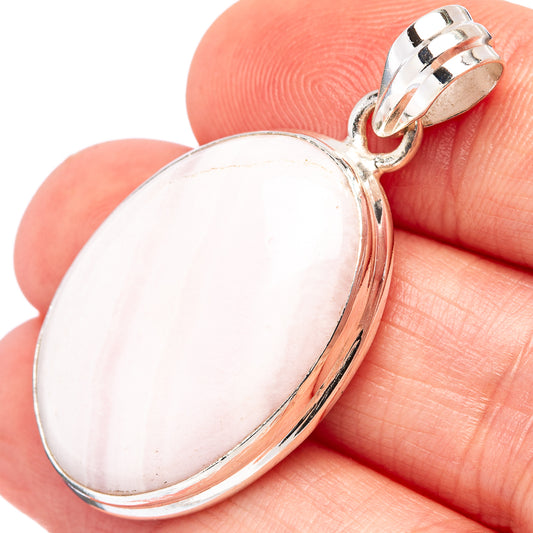 Pink opal oval pendant in .925 sterling silver with hinged bail