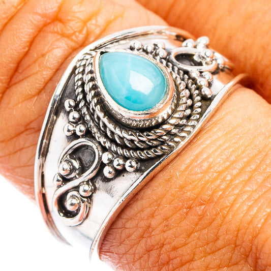 Turquoise oval larimar stone set in ornate .925 sterling silver cocktail ring