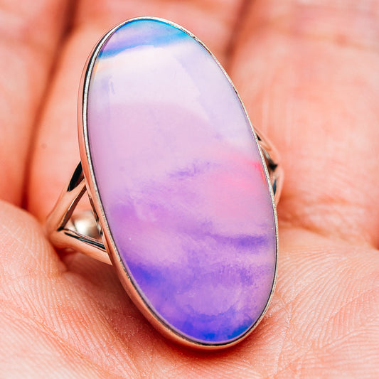 Sterling silver oval opal ring with pink-purple-blue aurora, rounded bezel and slim band