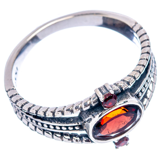 Garnet dainty ring with oval red stones and patterned .925 sterling silver band
