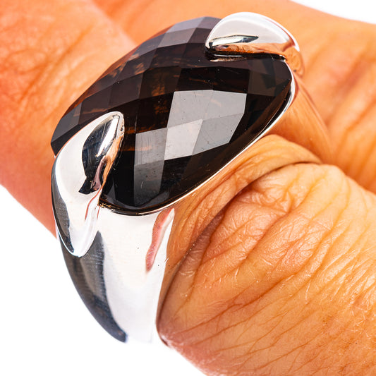 Sterling silver ring with faceted smoky quartz center, shiny polished band