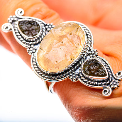Sterling silver ring with large oval amber and dark teardrop stones, size 9